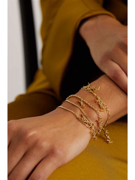 ysl charm bracelet gold|saint laurent gold bracelet.